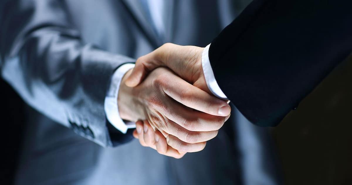 Formal contract signing representing underwriter selection