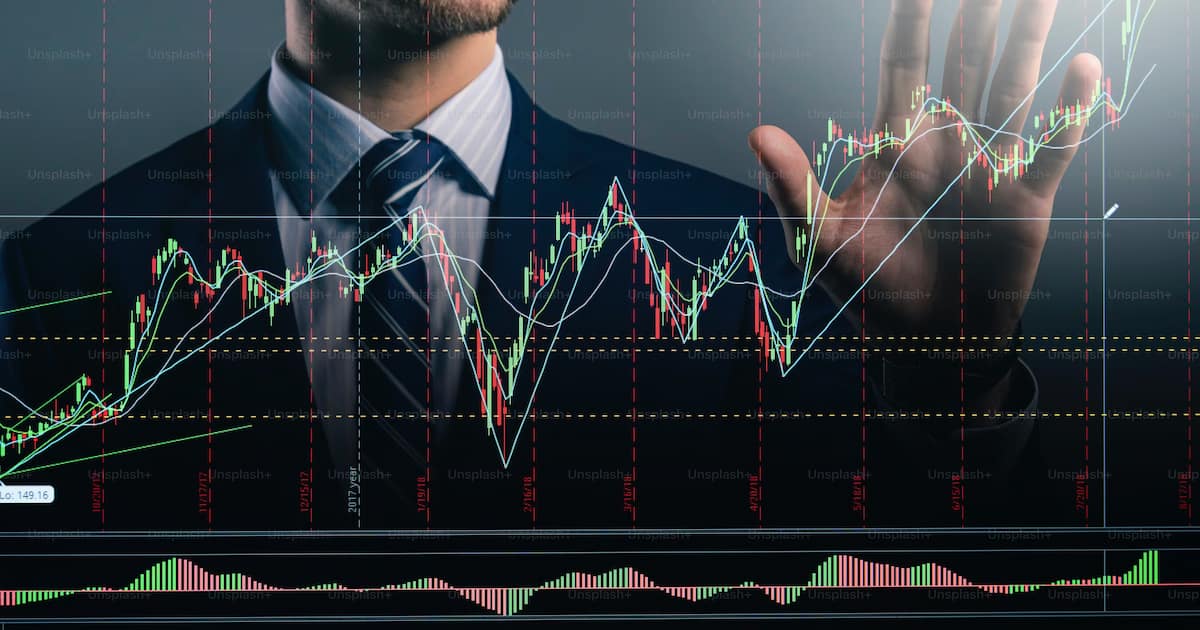 Financial charts and data analysis on dark screen